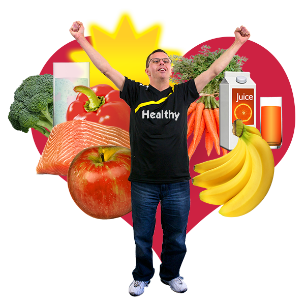 Person celebrating in front of lots of healthy foods
